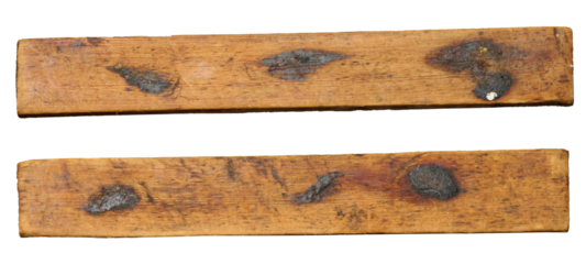 Two old long rectangular pieces of wood on an isolated background