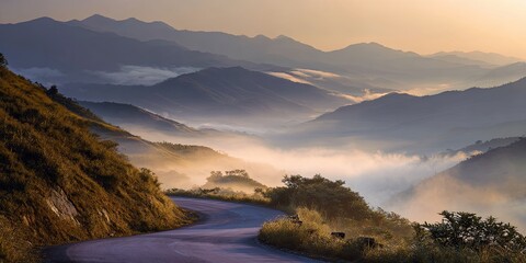 Naklejka premium Serpentine road through misty mountains at sunrise, soft light and fog layers, cinematic atmosphere, travel adventure concept