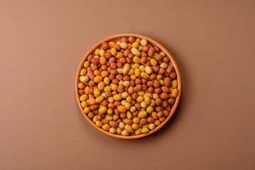 Food, nuts coated with salt and paprika, peanuts as a source of protein. Salted peanuts