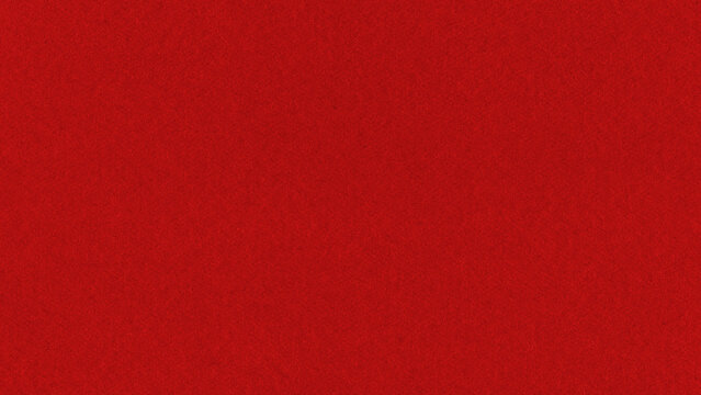 Red handmade paper texture with fibrous details and rough surface, ideal as decorative background or graphic design element.
