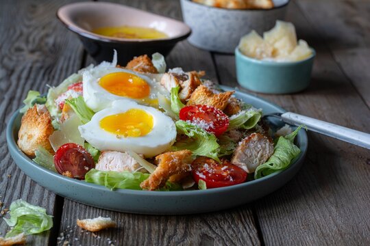 Fresh Caesar salad with chicken. Healthy breakfast, brunch.