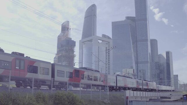 Electric trains passing Moscow City skyscrapers, D-Log footage