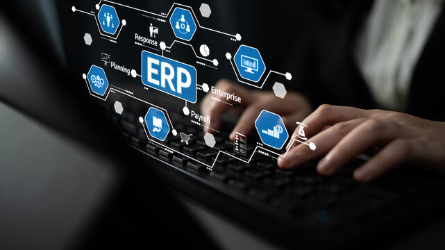 A person is using a keyboard with a digital interface showcasing various ERP features, highlighting the importance of technology in business management and efficiency. Tessel - Powered by Adobe