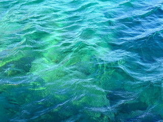 Sea waves beautiful clear surface.