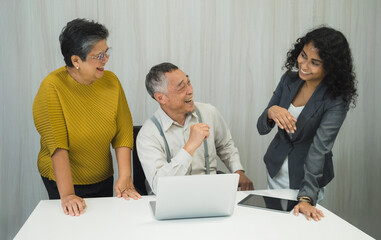 Manager employee business professional meeting talk about marketing finance future plan discuss work on table. use laptop tablet in modern office features minimal decor creat clean and professional.