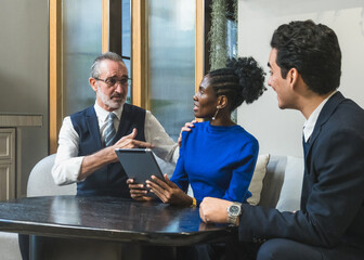 business meeting discussion among people seat around table modern office tablet on table convey collaboration communication relax working environment making suitable content related team office life.