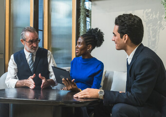 business meeting discussion among people seat around table modern office tablet on table convey collaboration communication relax working environment making suitable content related team office life.