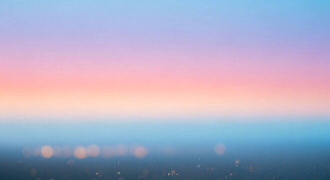 Soft Pastel Sky Gradient Over Blurred City Lights at Dusk