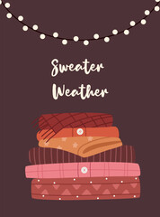 Illustration of folded warm sweaters in earthy tones with winter patterns and a scarf on top. Cozy Scandinavian minimalism style with “Sweater Weather” quote and string lights above.