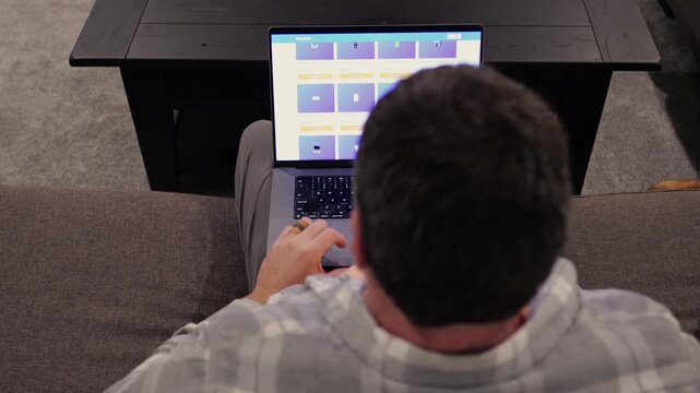 Man in White and Gray Flannel Shirt Online Shopping - E-Commerce Technology at Home Concept