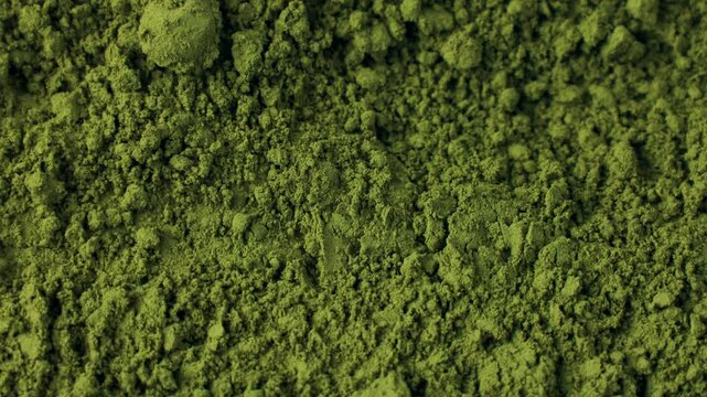 Matcha green tea powder circle rotation top view. Moringa, Spirulina, chlorella superfoods