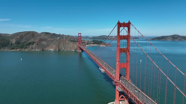San Francisco, California, USA, June 5, 2025 - Aerial drone view showing the Golden Gate Bridge, coastal cliffs, the Pacific Ocean, and the surrounding Bay Area on a clear summer day