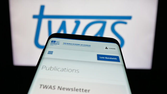 Stuttgart, Germany - 11-01-2025: Mobile phone with website of The World Academy of Sciences (TWAS) on screen in front of logo. Focus on top-left of phone display.