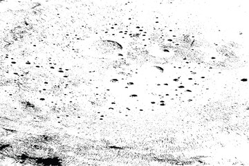 Fototapeta premium Abstract black and white textured background with scattered dots and circular shapes, resembling a distressed surface or cosmic dust.