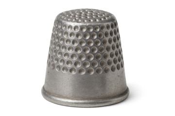 Vintage metal thimble protecting fingers while sewing clothes