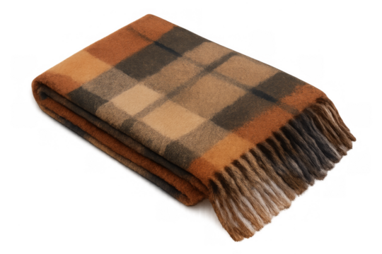 Folded plaid wool blanket with fringes on transparent background