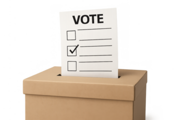 Vote ballot going into a cardboard ballot box