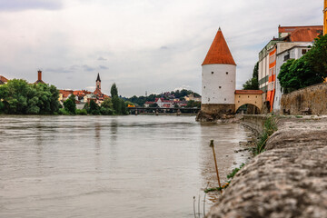 Panoramic view Schaibling Tower and promenade on river Inn, Passau, Lower Bavaria, Germany.