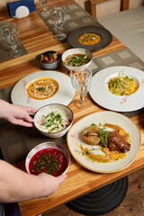 Enjoy a Variety of Delicious International Cuisine Served Elegantly on a Beautiful Table