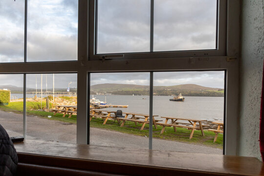 The view of Bantry across Banty Bay from the only pub on bucolic Whiddy Island Bay in southwestern Ireland.