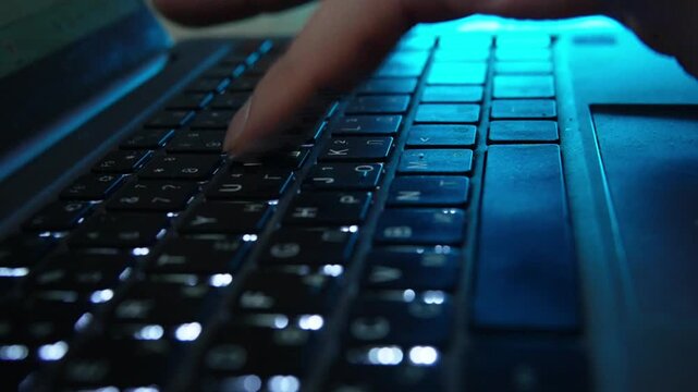 a close-up of hands typing on a laptop keyboard, symbolizing work, programming, or online communication.