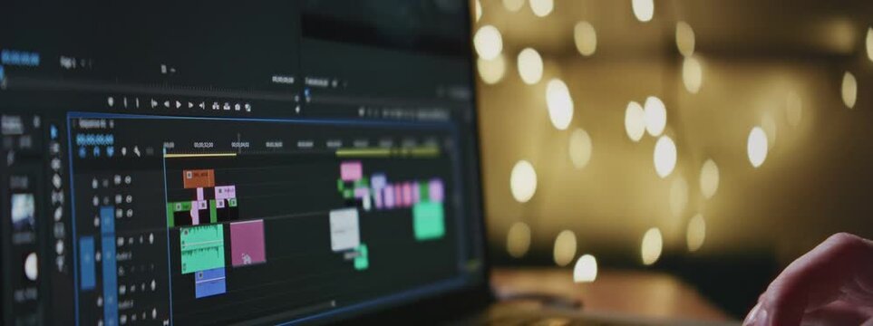 Video editing on a laptop. Monitor the computer the work of the interface program for video editing: the fragments are connected timeline. Video or sound processing, postproduction, film maker