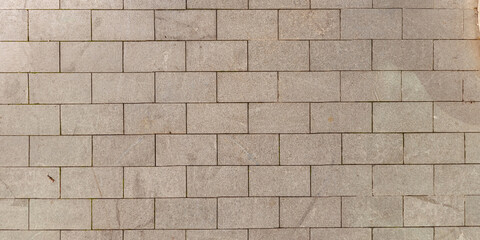 top view of the surface of a pedestrian path with paving slabs