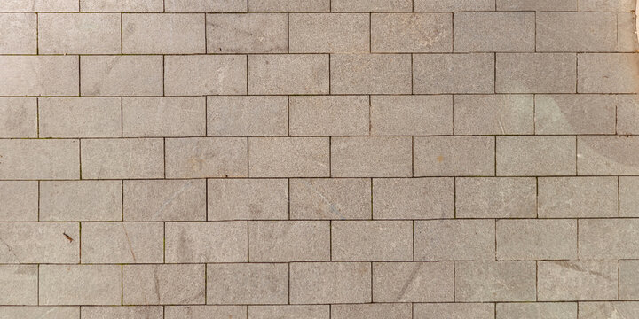 top view of the surface of a pedestrian path with paving slabs
