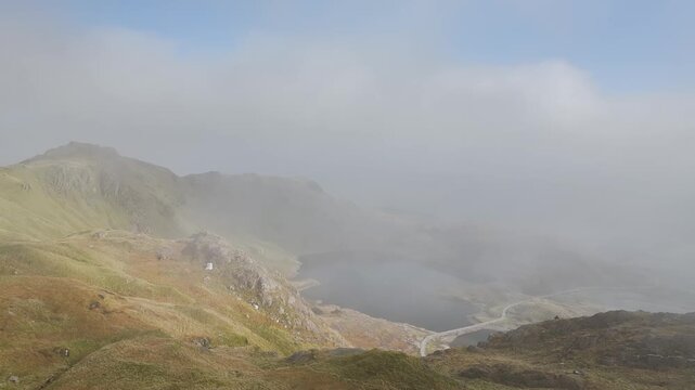 Pyg Track and Llyn Llydaw lake in clouds from a drone, Pen-y-Pass, mountain pass, Snowdonia, Gwynedd, north-west Wales, UK