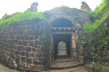 Daulatabad fort entrance in maharashtra india. Built with massive stone walls showcasing medieval military architecture and cultural heritage.It is now an  tourist attraction with historical building.