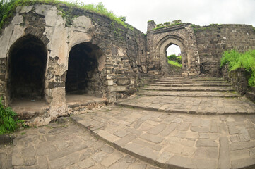 Daulatabad fort entrance in maharashtra india. Built with massive stone walls showcasing medieval military architecture and cultural heritage.It is now an  tourist attraction with historical building.