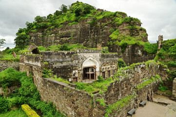 Daulatabad fort entrance in maharashtra india. Built with massive stone walls showcasing medieval military architecture and cultural heritage.It is now an  tourist attraction with historical building.