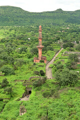 Chand Minar (Tower of the Moon) in Daulatabad fort entrance in maharashtra india.  Built with massive stone walls showcasing medieval military architecture and cultural heritageIt.