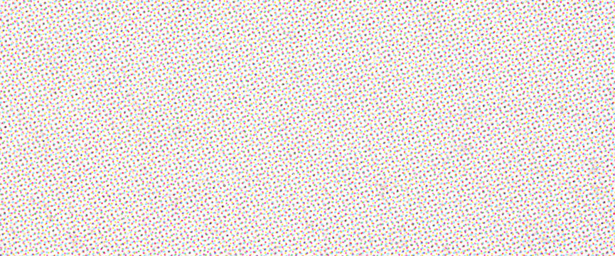 Close-Up of CMYK Halftone Dot Pattern on White Paper