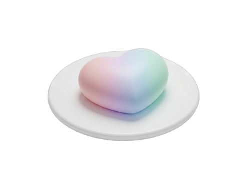 A Soft Pastel Heart Shaped Object Sits On A White Plate Displaying A Gentle Gradient Of Colors Against A Clean White Background With Subtle Lighting
