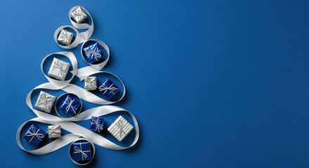 Elegant blue and silver presents form a stylized Christmas tree with ribbon on deep blue background, perfect for holiday celebration themes.