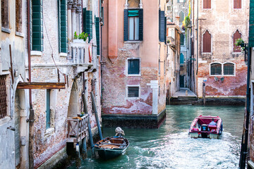 Venice - narrow canal and historic palaces, Italy