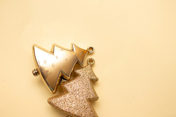 Golden Christmas ornaments on a colorful background