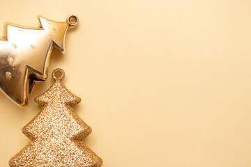 Golden Christmas ornaments on a colorful background