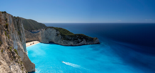 Obraz premium Greece, Zakynthos, Navagio Beach - 5 April 2024 - View of Navagio Beach and nearby imposing rocks in Zakynthos