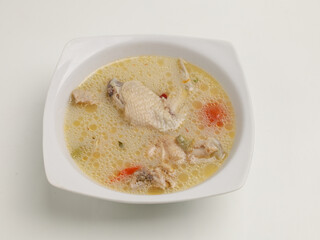Garang Asem is chicken cooked in coconut milk with spices and tamarind, bilimbi or lime 