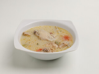 Garang Asem is chicken cooked in coconut milk with spices and tamarind, bilimbi or lime 