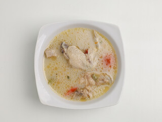 Garang Asem is chicken cooked in coconut milk with spices and tamarind, bilimbi or lime 