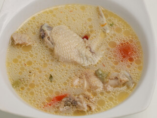 Garang Asem is chicken cooked in coconut milk with spices and tamarind, bilimbi or lime 