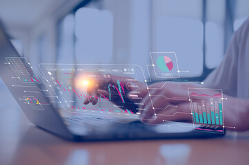 investment financial concept Business finance data analytics graph.Financial management technology.Advisor using KPI Dashboard on virtual screen, man using computer laptop working with data charts