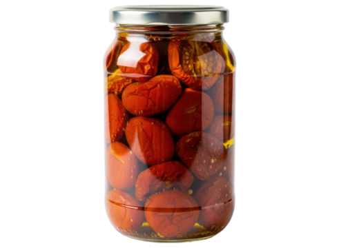 Glass jar filled with delicious sun dried tomatoes preserved in olive oil