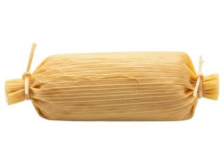 Traditional mexican tamale wrapped in corn husk ready to eat