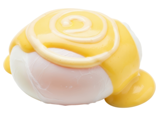 Perfectly poached egg with rich yellow hollandaise sauce drizzled on top