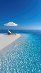Serene Tropical Beach Scene With A White Parasol And Lounge Chair Under A Clear Blue Sky With Sparkling Ocean Water