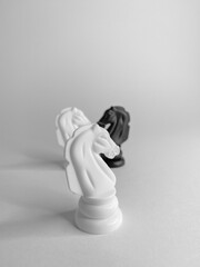 white chess pieces on white background 